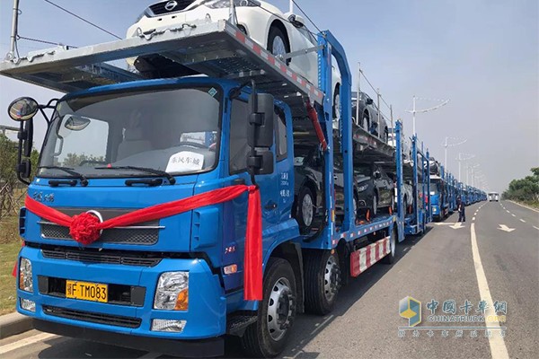 2018年5月8日，9家物流承运商与东风商用车有限公司签订1000辆轿运车订单